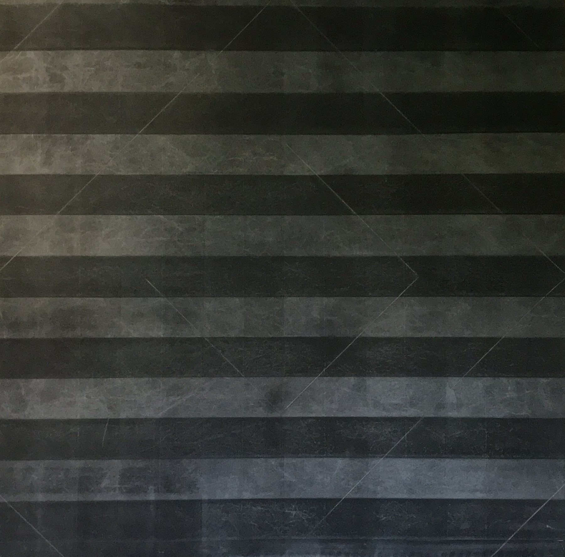 Horizontal bands of black and charcoal grey across a square canvas, with faint diagonal fold lines. Erasure No.10, 2021 by Emma Hurst.