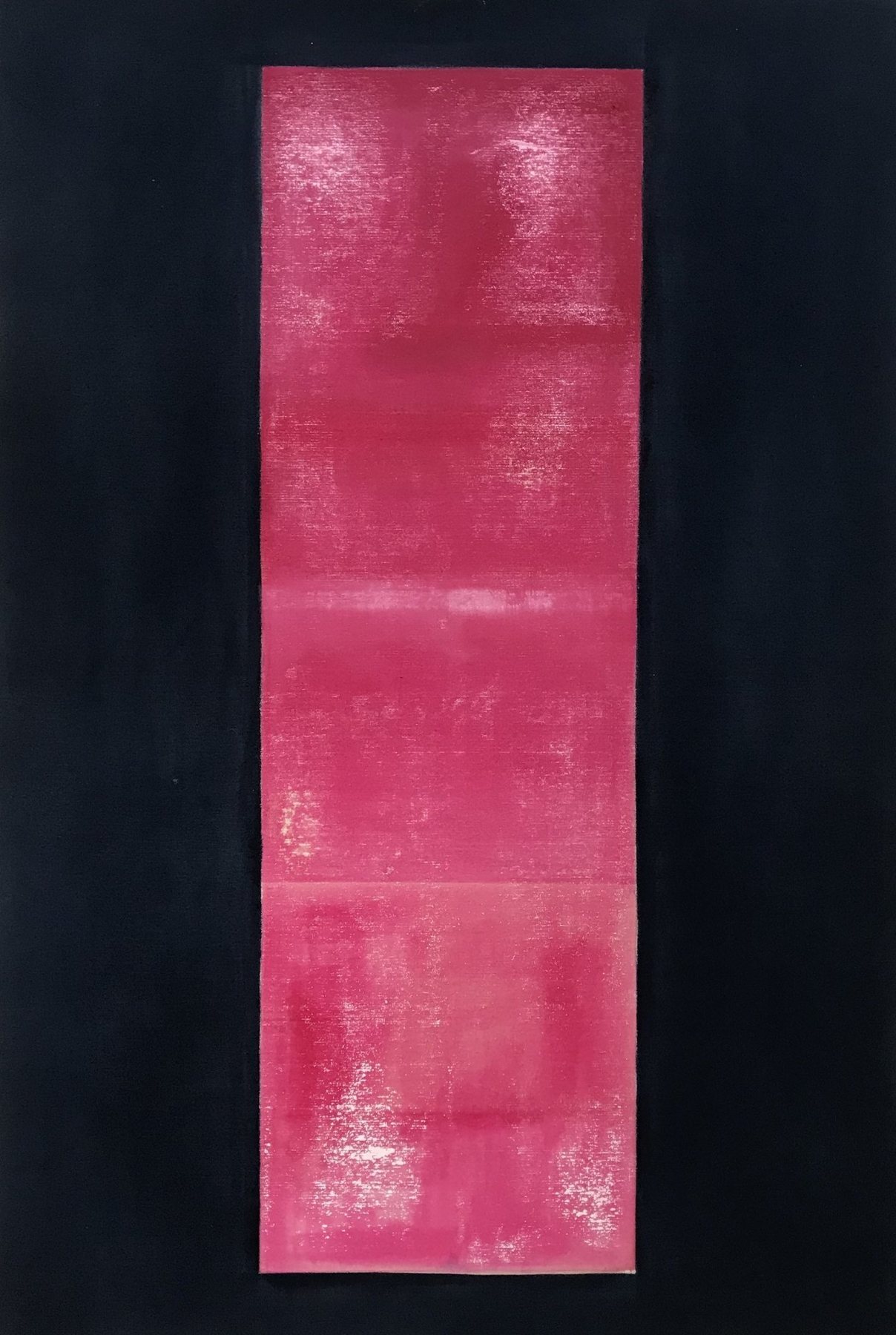 A vertical band of stained pink canvas set on a deep navy ground. Untitled, 2020 by Emma Hurst.